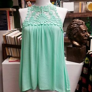 Mint blouse with lace embellishments